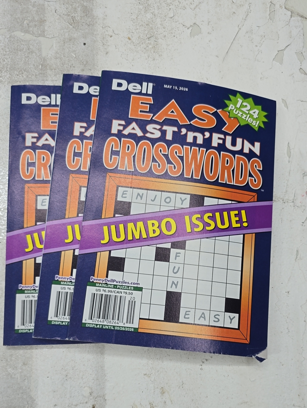 Dell Easy Fast 'n' Fun Crosswords Jumbo Issue - Purple, Orange & Yellow